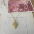 Double-layered gold paperclip chain necklace with sparkling letter T pendant charm - Letter T