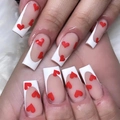 Matte French manicure press-on nails with white tips and red heart patterns on hand - Matte French Red Heart Style (JP2239)