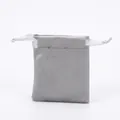 Detail of gray velvet jewelry pouch with soft texture and silk drawstring closure - Gray
