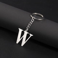 Polished silver metal keychain featuring a capital letter W pendant on dark leather background - Letter W