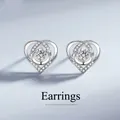 Funkelnde S925 Silber Herzohrringe mit glänzenden Zirkonia Steinen und feiner Pavé Fassung - Weiße Strass-Herz-Ohrstecker (ED09)
