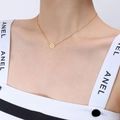 Gold plated 18k necklace with round Chinese Fu character pendant on elegant model - Gold Necklace (40+5cm)