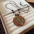 Bohemian brown wooden round pendant necklace with bronze leaf and tassels in a gift box - Style 16 Leaf Hollow Round Beaded Necklace