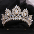 Detailed view of the gold tiara base featuring light blue marquise gemstones and crystals - KC Gold White Rhinestone + Blue Opal
