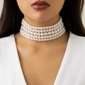 Detail of elegant five-layer white pearl choker necklace with smooth luster on model - Silver 5-layer Pearl Choker
