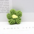 Handmade emerald green crochet milk cotton flower accessory with yellow stamen detail - Army Green