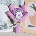 Handmade knitted puff flower bouquet with purple and white blossoms in mesh packaging - Purple