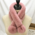 Pink faux rabbit fur scarf with decorative pom-poms on a female mannequin bust - Dusty Pink