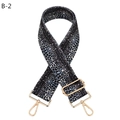 Close-up of leopard pattern bag strap with golden metal clasps and adjustable buckle - B-2 Navy Blue & Black Leopard / Silver Clasp