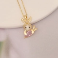 Detail of 18K gold plated necklace with rabbit pendant holding pink pear-shaped stone - Rabbit with Carrot Pink Gem (14#)
