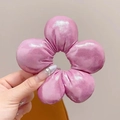 Detail of a large pink fabric flower hair scrunchie with metallic luster finish - Shiny Pink (Approx. 10.5cm)