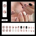 Cute black and white animal press-on nails with star patterns in soft pink finish - Cute Cat (R780)