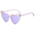 Detail view of heart-shaped purple glitter sunglasses with transparent lenses and UV400 - Shiny Purple