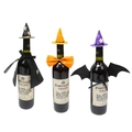 Trio of mini witch hats and capes decorating wine bottles for Halloween party setup - Halloween Bottle Wizard Hat Cloak Bowtie and Bat Wings Set