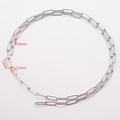 Detailed view of silver stainless steel paperclip chain links with 7.2mm length dimensions - Steel Color - Wide Link Cross Chain (Style 2)