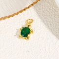 Macro view of gold turtle pendant with green oval gemstone and top link ring - Green (Turtle Style A)