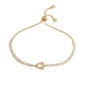 Macro shot of gold-plated adjustable bracelet with sparkling zircon buckle and slide clasp - Gold Libra