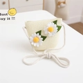 Close-up of beige straw woven crossbody bag for kids featuring daisy flower ornaments - Single Bag / Cream