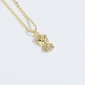 Golden bear pendant necklace featuring sparkling white rhinestones on a delicate chain - Big Head Bear