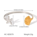 Detailed view of starfish and seashell charms on an open stainless steel cuff bracelet - Gold Silver Bicolor Starfish Shell Bracelet (HC-B20079)