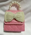 Pink mini crossbody bag for girls with quilted glitter fabric and pearl bow handle - Vertical Pink