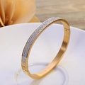 Rose gold bangle with triple-row micro-set crystals and brushed metal texture finish - Triple Row Rhinestone / Gold