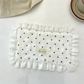 Close-up of a white cotton placemat with black heart patterns and delicate lace borders - Black Placemat