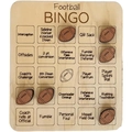 Macro detail of laser-engraved wooden football bingo board and ball-shaped game markers - Rugby Ball