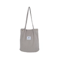 Vertical corduroy shoulder bag in light grey with minimalist label and snap button closure - Gray