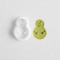 White snowman-shaped cookie mold set with green embossed snowman biscuit on white background - E0857-Snowman
