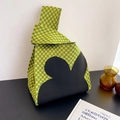 Knit tote bag with yellow and green checkerboard pattern and black flower detail - Green