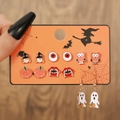 Set of 6 Halloween stud earrings featuring pumpkin, ghost, and owl on a display card - 6 Pairs Combination B E1258-1