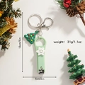 Detailed size view of Santa Christmas nail clipper keychain with dimensions and weight info - Snowflake Style
