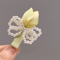 Handmade yellow tulip hair clip with white pearl bow on light green fabric band - Yellow Tulip Hair Clip