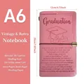 Pink PU leather A6 travel notebook with graduation motifs and vintage strap closure - Graduation / Pink