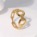 Minimalist gold titanium steel chain link ring with double crossover design on white stone - Adjustable / Gold