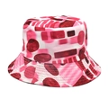 Close-up of pink bucket hat featuring abstract geometric patterns and colorful dots - M (56-58cm) / Red