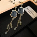 Detail of long tassel earrings with bamboo ink patterns and green resin beads - Green Ink Painting Bamboo Tassel Earrings With 925 Sterling Silver Pin