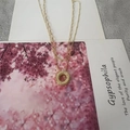 Double-layered gold paperclip and bead chain necklace with textured round pendant - Letter O