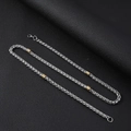 Dettaglio della collana a catena a lisca di pesce bicolore su pelle nera - Collana 55CM / Argento e Oro