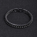 Macro detail of black stainless steel Cuban chain link with engraved steel hallmark - 19cm / Black 10mm