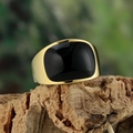 Mens gold stainless steel ring with square black stone on a rustic wooden background - US 7 / Gold Black