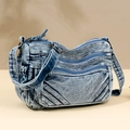Light blue washed denim crossbody bag with multiple zipper layers and adjustable strap - Blue