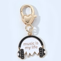 Portachiavi con cuore dorato e ciondolo a forma di cuffie con testo a tema musicale - Cuffie