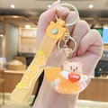 Orange bear milk tea liquid keychain with floating moon pendant and sequins - Moon Bear - Orange
