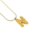 Golden letter N pendant necklace with a textured lava finish on a sleek snake chain - Letter N