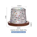 Rotating whiskey glass with colorful checkered patterns and round wooden base, 150ml capacity - Checkered Color Block Tumbler Glass With Wood Base