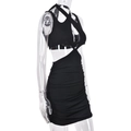 Detail of black halter dress showing side ruching and waist cutout on stretchy fabric - S / Black