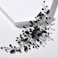 Detailed close-up of bridal hair comb with black wire, clear crystals and dark gemstones - Black Crystal + Black Wire