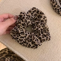 Close-up of vintage leopard print hair scrunchie with dense fabric folds and soft texture - Light Leopard Scrunchie